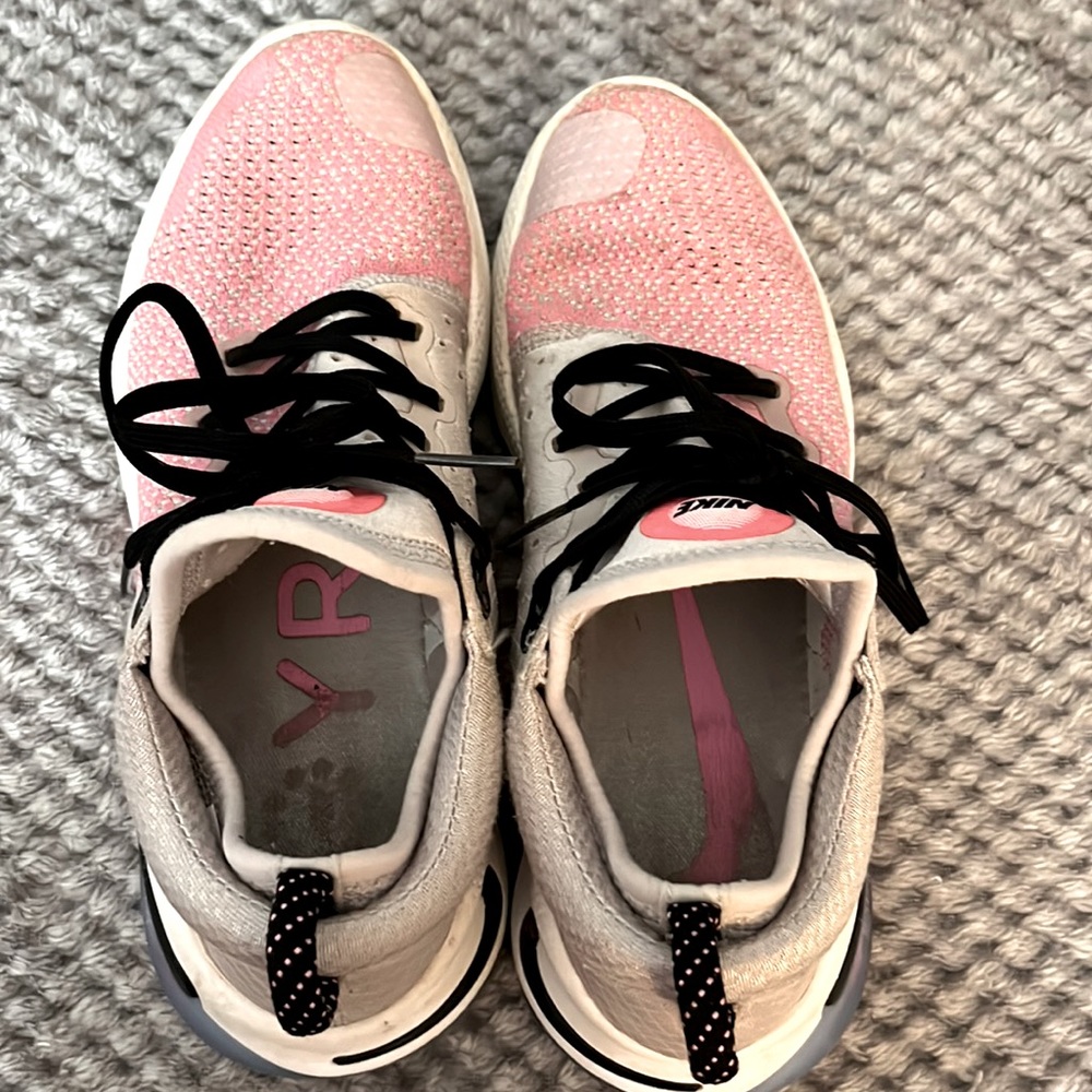 Pink Nike joyride. Great shape Foamie satin side, and mesh like material on top.